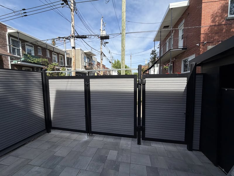 Composite privacy fence installation in Stone Grey — Stone Grey