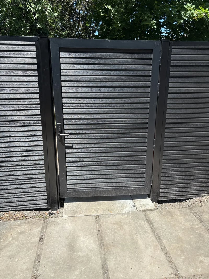 Composite privacy fence installation in Celestial Black — Celestial Black